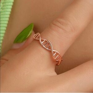Rose gold colored DNA ring
